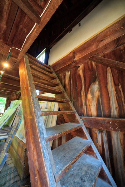 Stairs to the upper level of MacNamara House's original barn