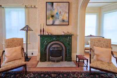 Feature fireplace in the great room at MacNamara House