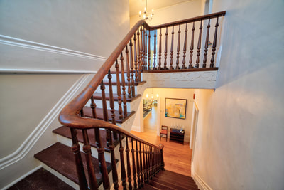 Staircase leading to the upstairs bedrooms 